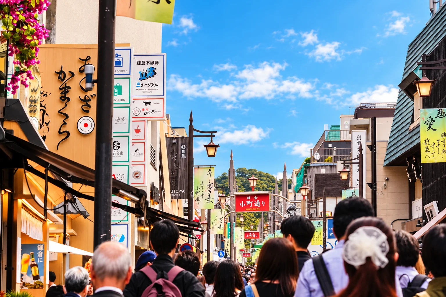 Visitors walking between shops and restaurants on Komachi Street in Kamakura.