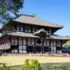 The broad wooden facade and curved roof of Todai-ji’s Great Buddha Hall in Nara.