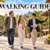A private walking guide explaining Japanese temple sights to two guests, with a Toyota Alphard in the background.